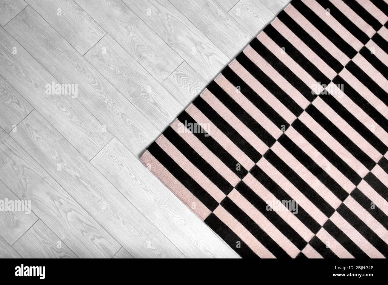 Black and white striped carpet on floor Stock Photo Alamy