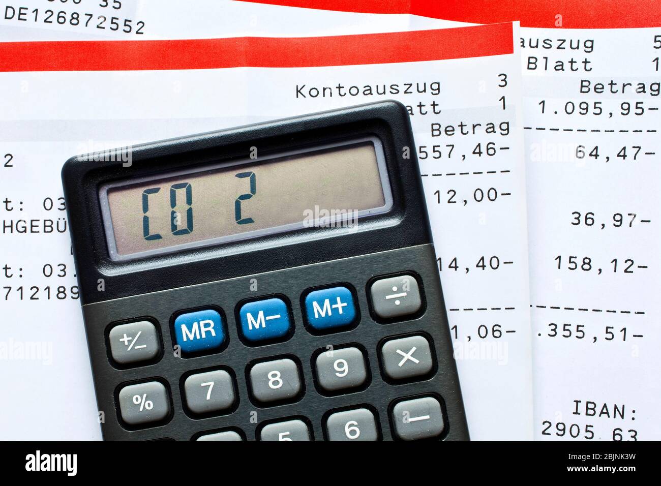 pocket calculator with CO2 on the display on account statements, symbol for climate protection costs, Germany Stock Photo