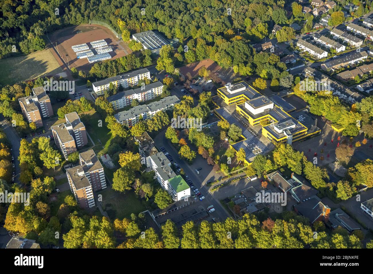 Container settlement as temporary shelter and reception center for refugees at the sports ground of the Ingeborg Drewitz Gesamtschule in Gladbeck, 16.10.2016, aerial view, Germany, North Rhine-Westphalia, Ruhr Area, Gladbeck Stock Photo