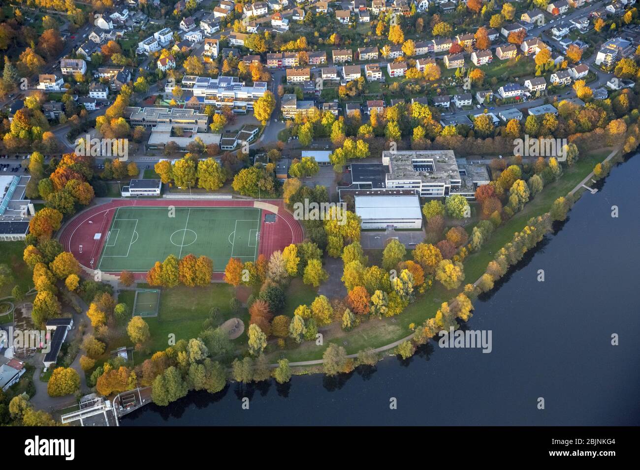 School building of the Friedrich Harkort Schule in Herdecke at river Ruhr and the sports complex of the TSG Fussball Herdecke 1911 e.V., 31.10.2016, aerial view, Germany, North Rhine-Westphalia, Ruhr Area, Herdecke Stock Photo