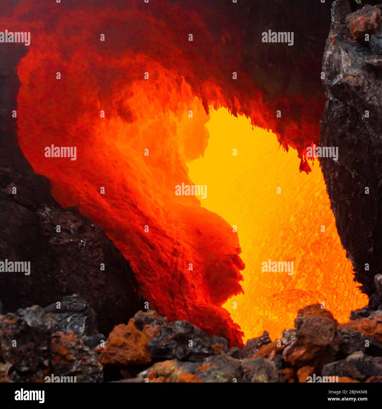Eruption of Volcano Tolbachik, boiling magma flowing through lava tubes  under the layer of solid lava, Kamchatka Peninsula, Russia Stock Photo -  Alamy