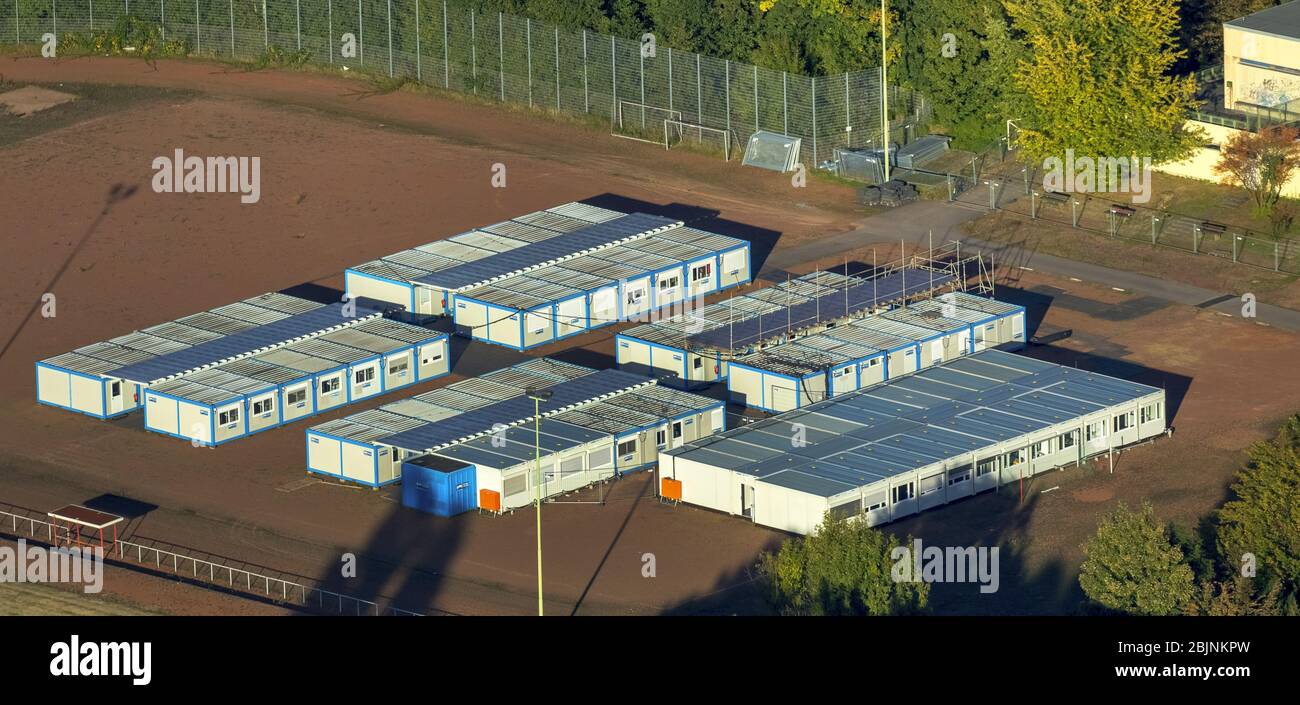 Container settlement as temporary shelter and reception center for refugees on the areal of Gesamtschule Rentfort in Gladbeck, 16.10.2016, aerial view, Germany, North Rhine-Westphalia, Ruhr Area, Gladbeck Stock Photo