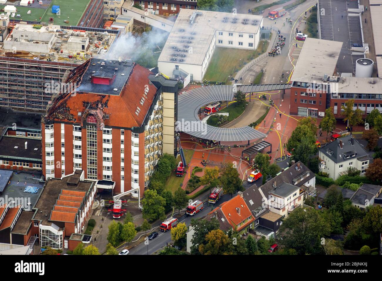 Fire fighting at the building of hospital Bergmannsheil in Bochum, 30.09.2016, aerial view, Germany, North Rhine-Westphalia, Ruhr Area, Bochum Stock Photo