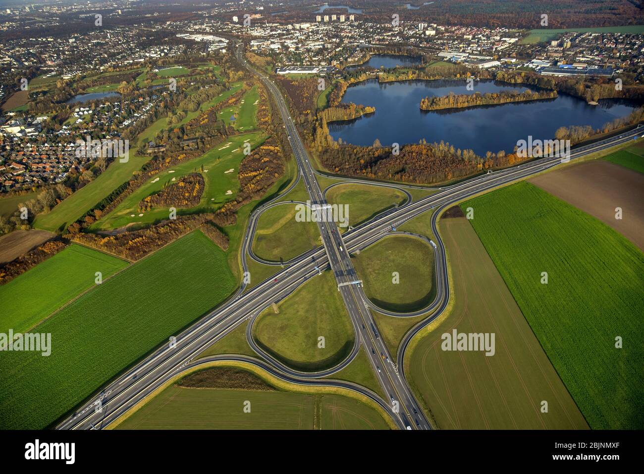 junction of A59 with A524, B8 and B288 at lake Rahmer See in Duisburg, 23.11.2016, aerial view, Germany, North Rhine-Westphalia, Ruhr Area, Duisburg Stock Photo