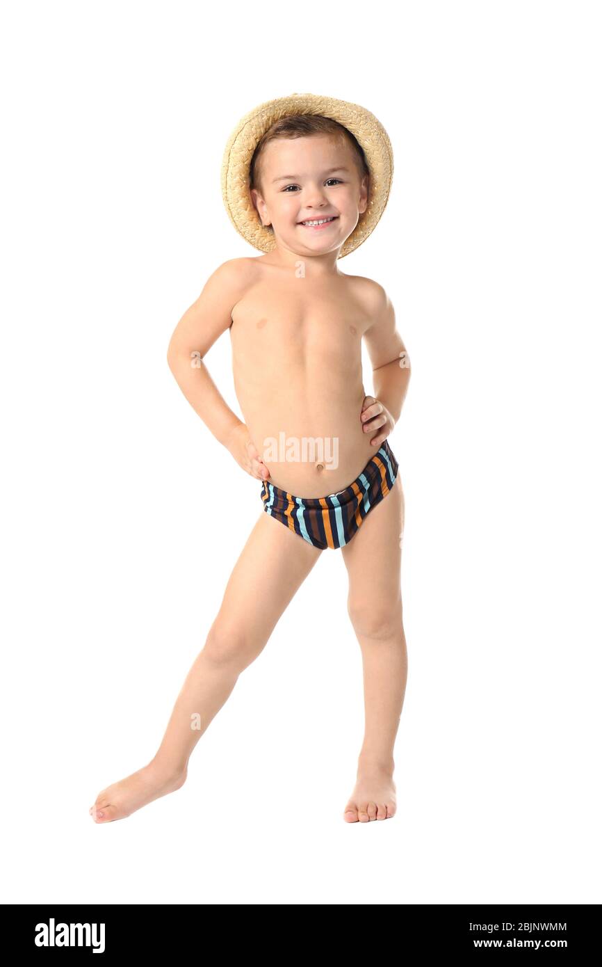 Cute little boy in hat and swimming trunks on white background Stock Photo