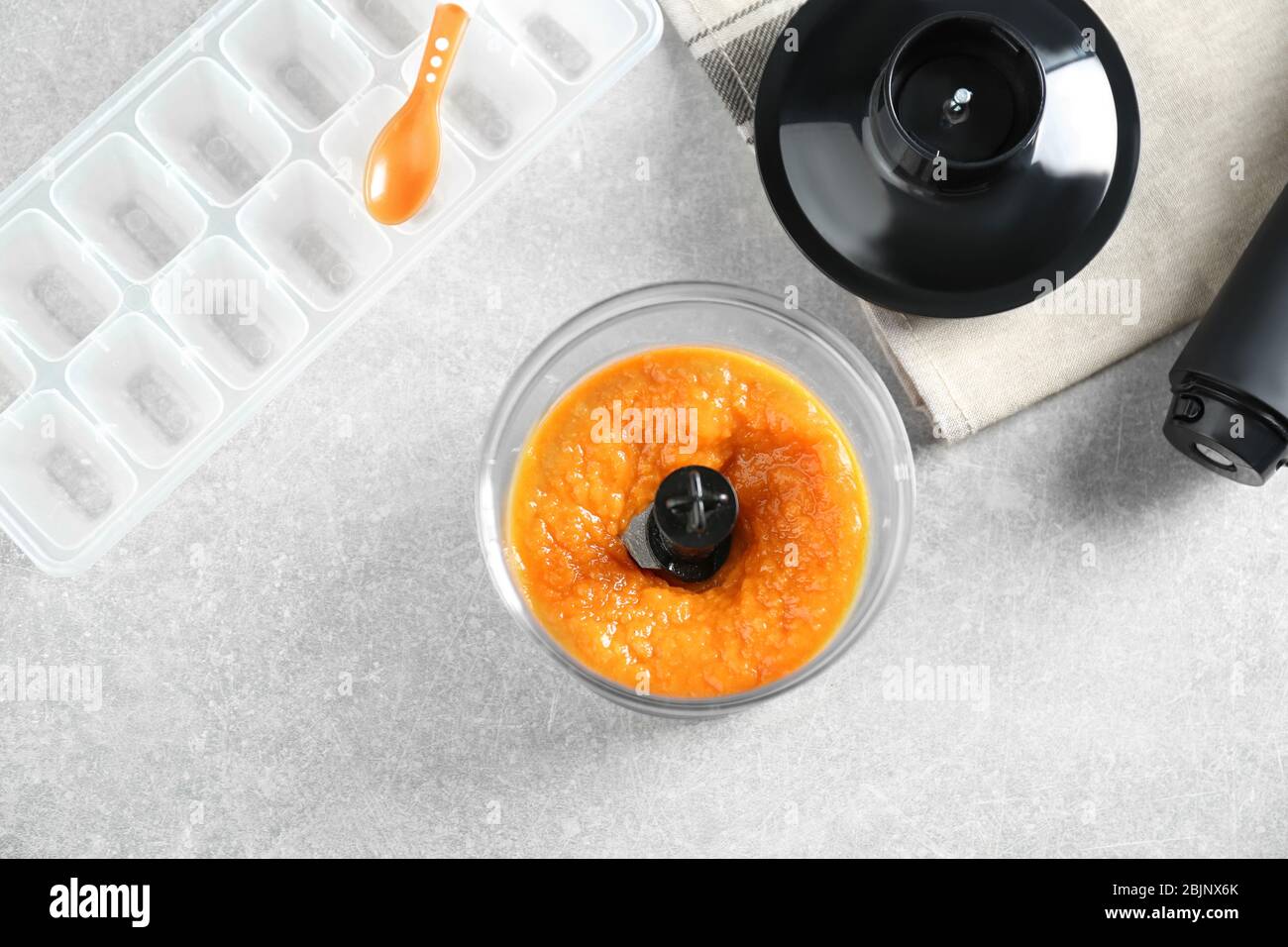 Blender with vegetable puree on light background Stock Photo