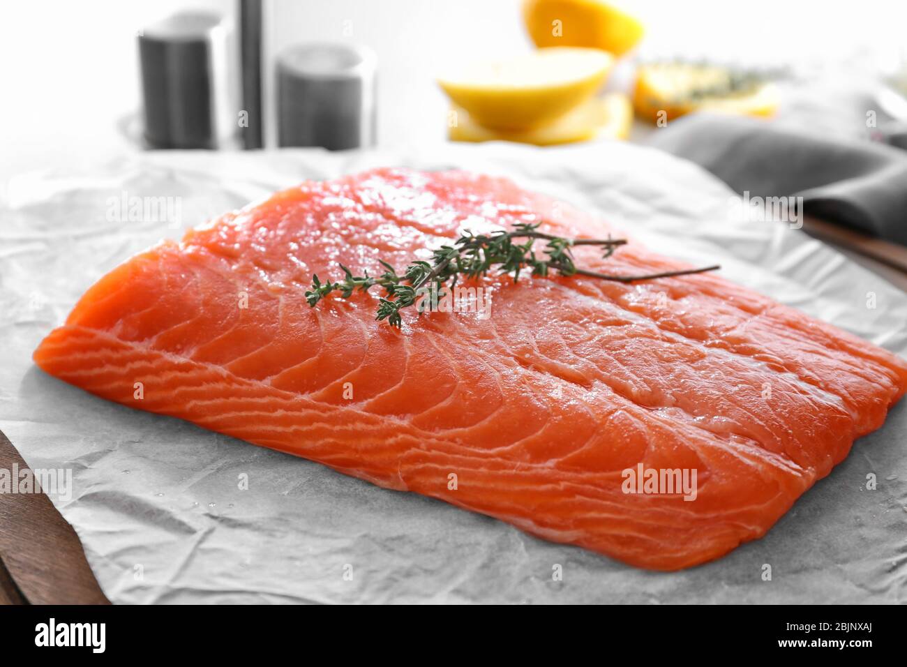 Fresh raw salmon fillet on parchment, closeup Stock Photo - Alamy