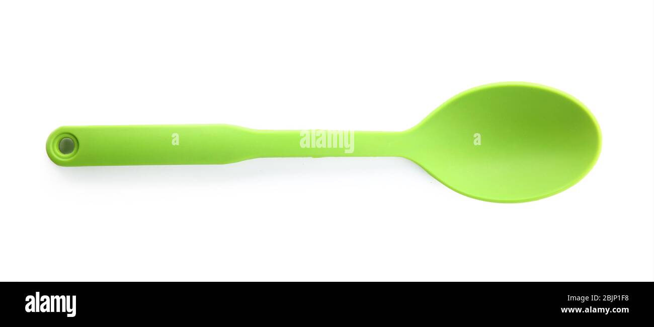 Plastic spoon on white background Stock Photo - Alamy