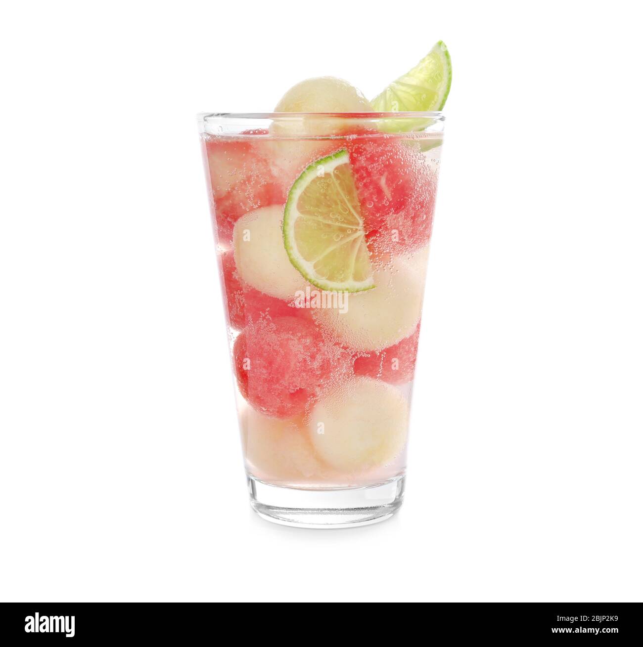 Glass with melon ball drink on white background Stock Photo