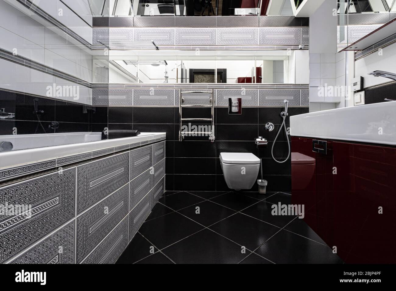 Interior of a modern bright bathroom with a sink and toilet Stock Photo