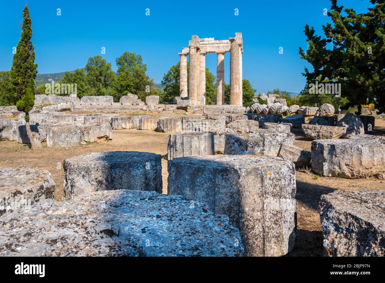 Temple of Zeus at archaeological site of Nemea in Greece. It has three architectural styles, doric, ionic and corinthian Stock Photo