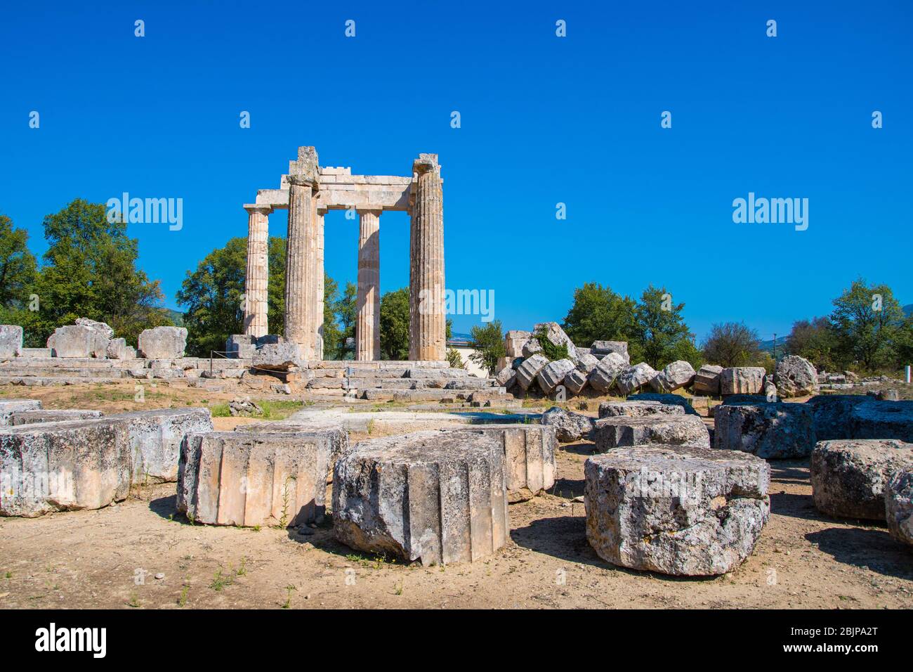 Temple of Zeus at archaeological site of Nemea in Greece. It has three architectural styles, doric, ionic and corinthian Stock Photo