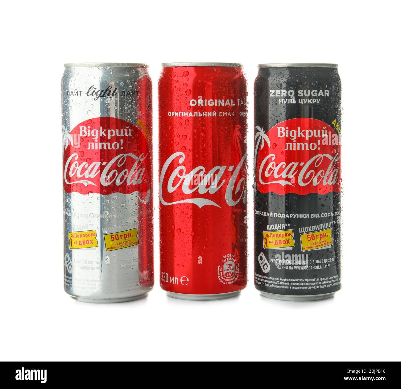 KYIV, UKRAINE - SEPTEMBER 18, 2017: Cans of Coca-Cola on white 