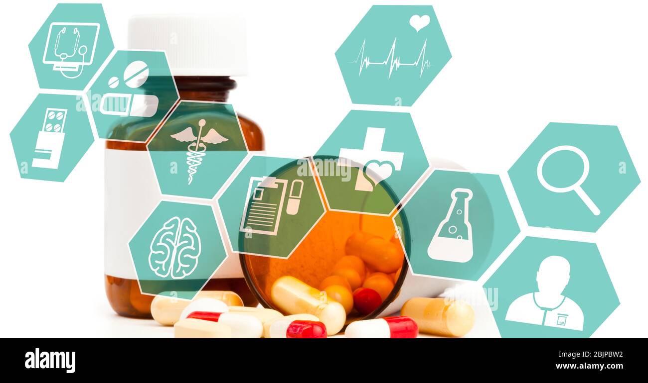 Digital illustration of medical icons over medical pills lying outside a jar in background Stock Photo