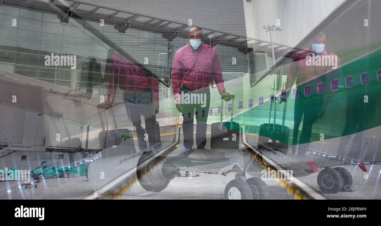 Digital illustration of man wearing coronavirus Covid19 mask over an empty airport in background Stock Photo