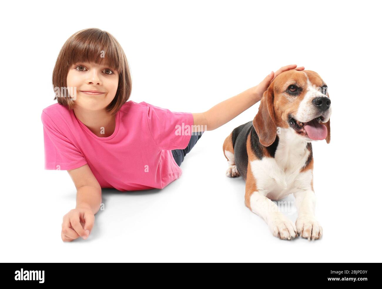 Cute little girl with dog on white background Stock Photo - Alamy