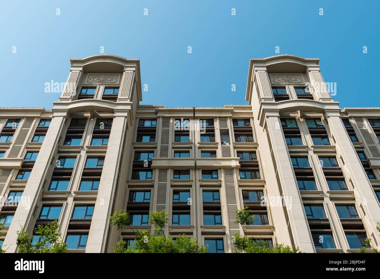 Residential area under blue sky and white clouds Stock Photo - Alamy