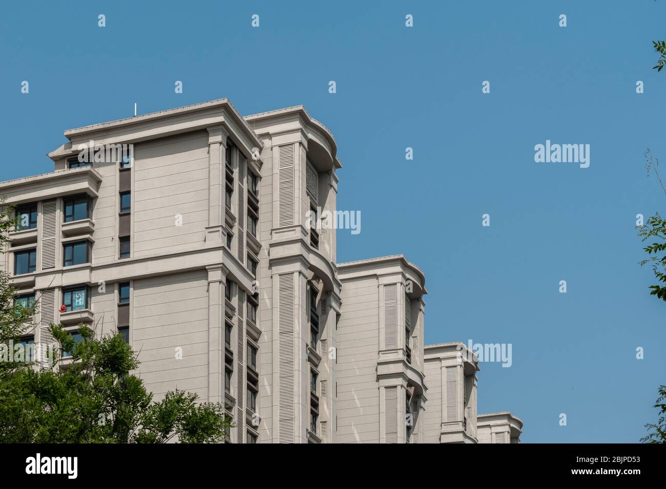Residential area under blue sky and white clouds Stock Photo - Alamy