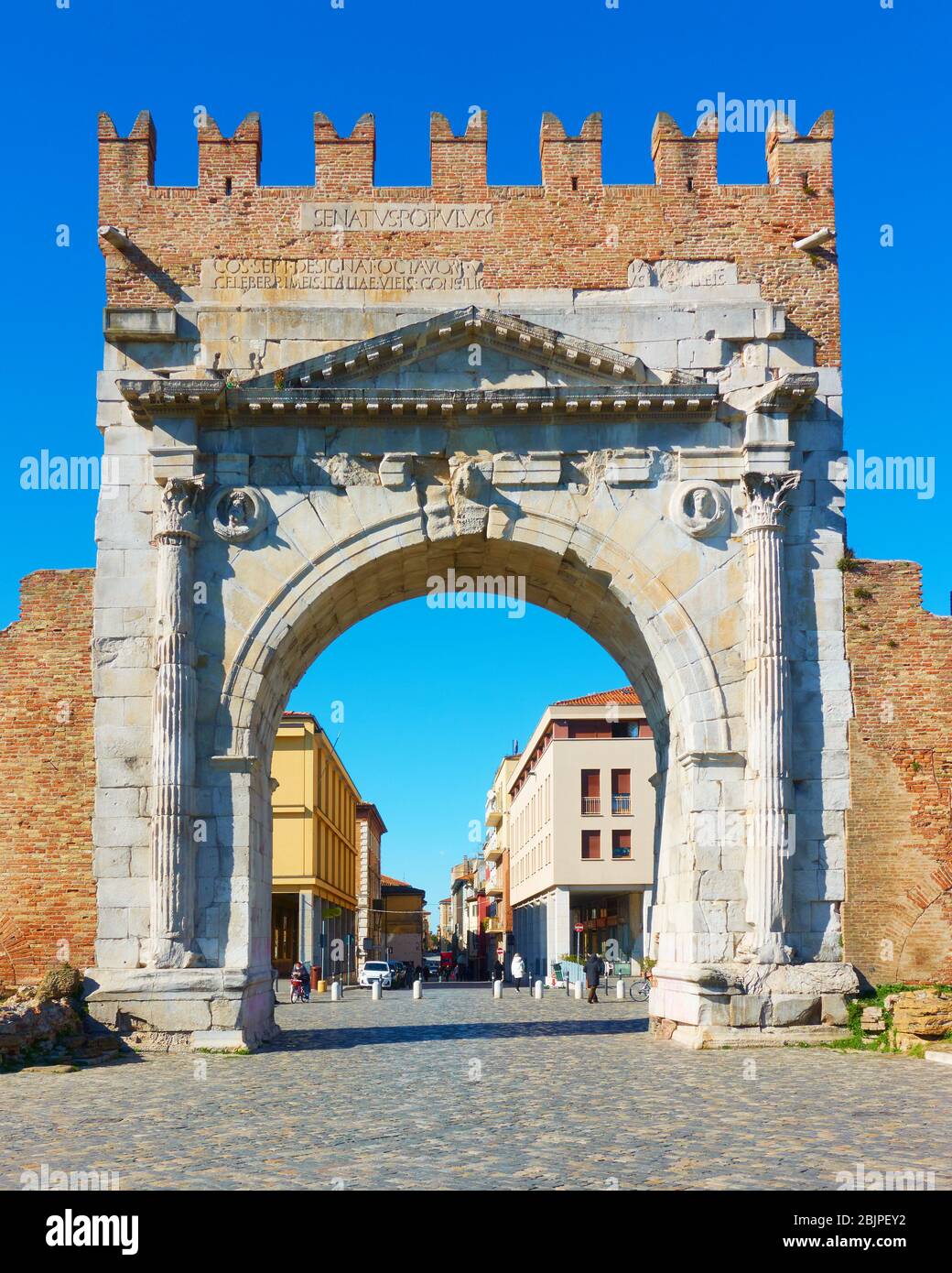 Arch of Augustus - Gate in the old town of Rimini, Italy. It was built in 27 BC and it is the oldest Roman arch which survives Stock Photo