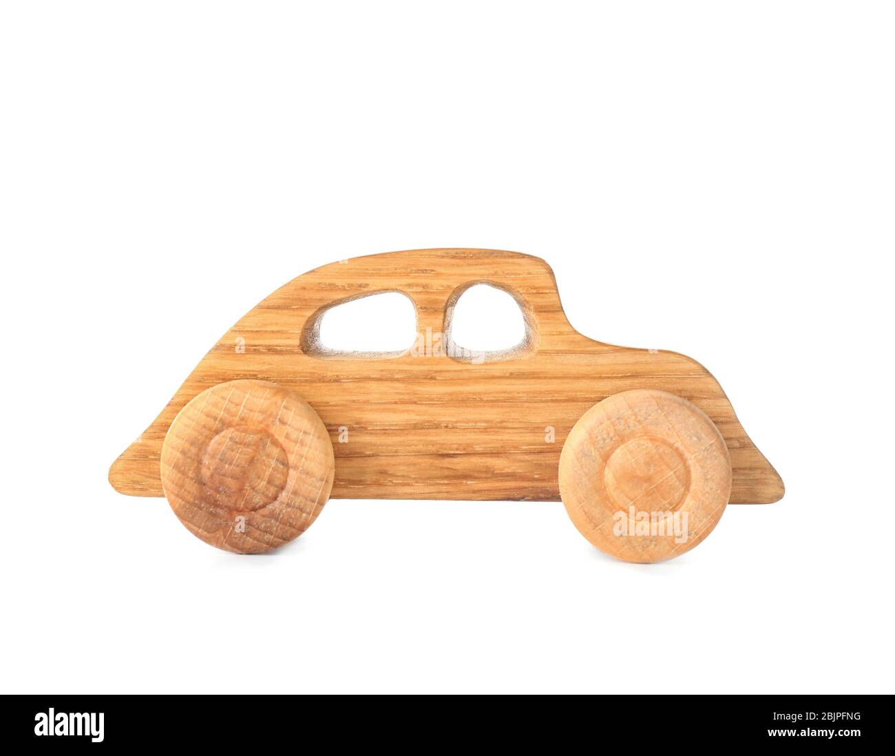 Wooden toy car on white background Stock Photo - Alamy