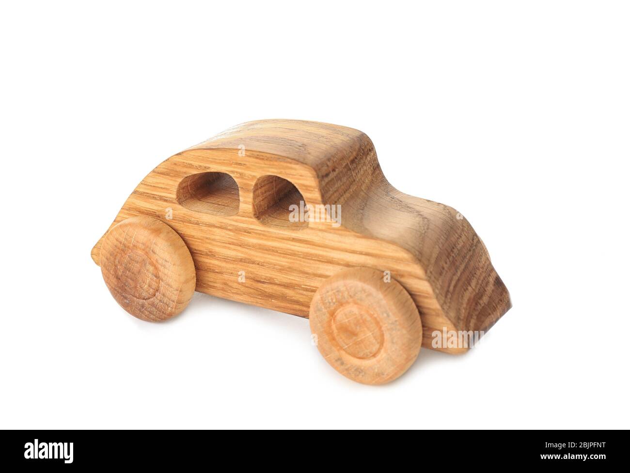 Wooden toy car on white background Stock Photo - Alamy
