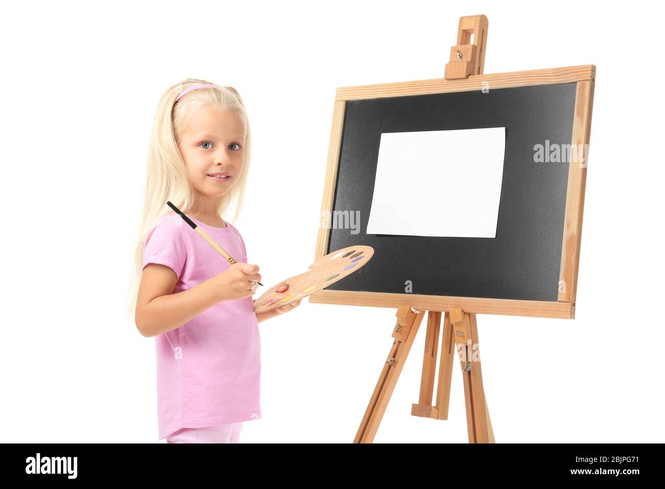 Cute little girl with palette, brush and easel for painting, on white ...