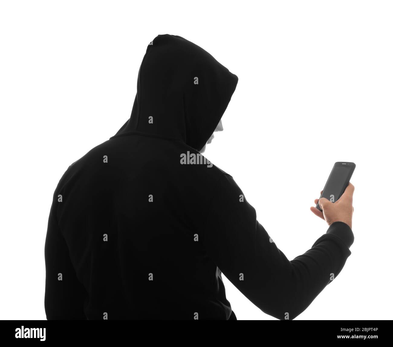 Hacker with phone on white background Stock Photo