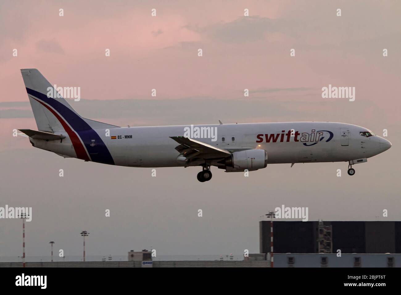 EC-MNM Swiftair Boeing 737-4Y0(SF) at Malpensa (MXP / LIMC), Milan, Italy Stock Photo