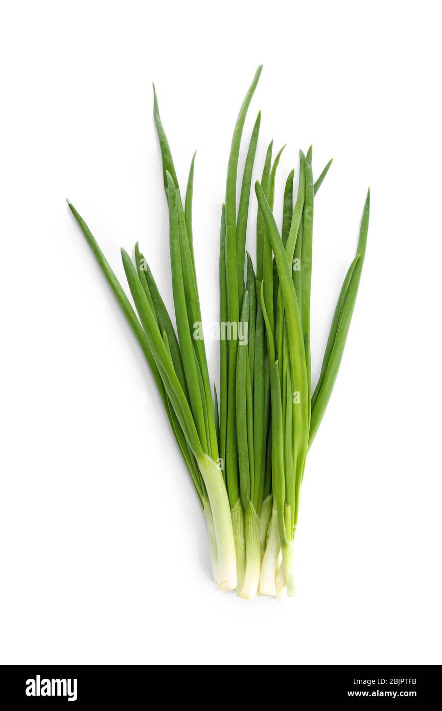 Fresh green onion on white background Stock Photo - Alamy