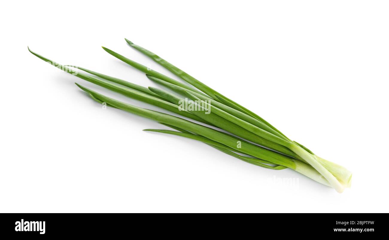 Fresh green onion on white background Stock Photo - Alamy