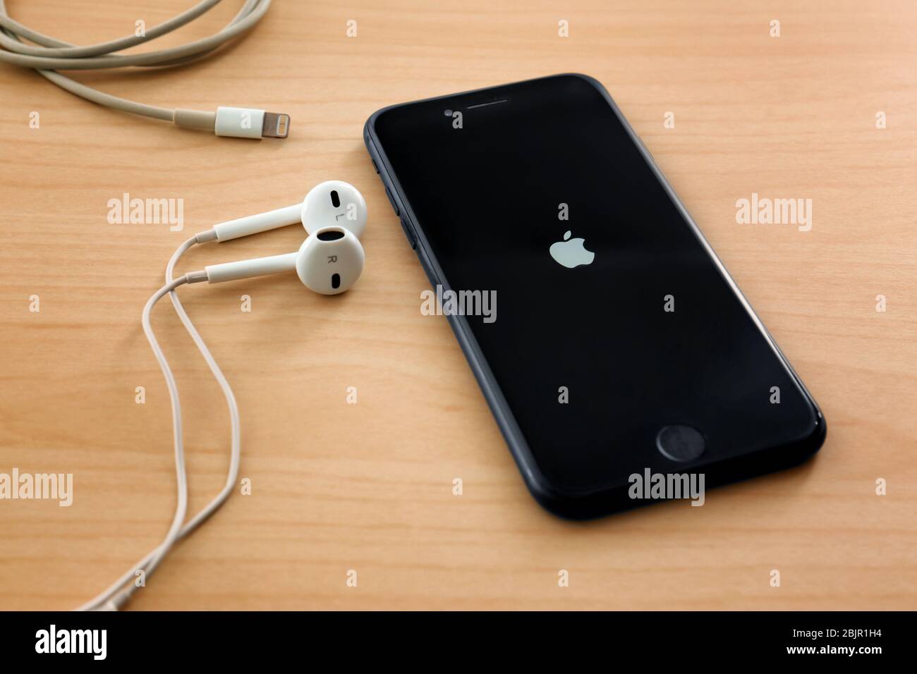 KIEV, UKRAINE - OCTOBER 17, 2017: Black iPhone 7 with earphones on table  Stock Photo - Alamy