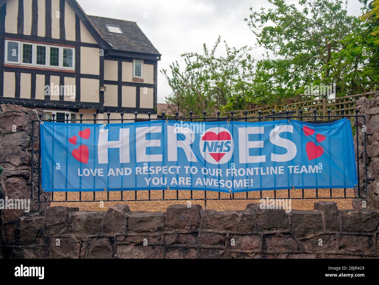Life under coronavirus Covid-19 pandemic lockdown: NHS Heroes banner poster showing love Stock Photo