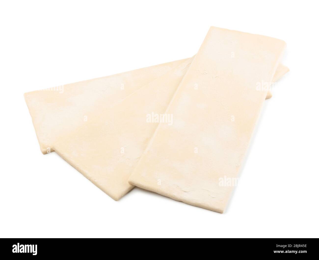 Raw puff pastry on white background Stock Photo - Alamy