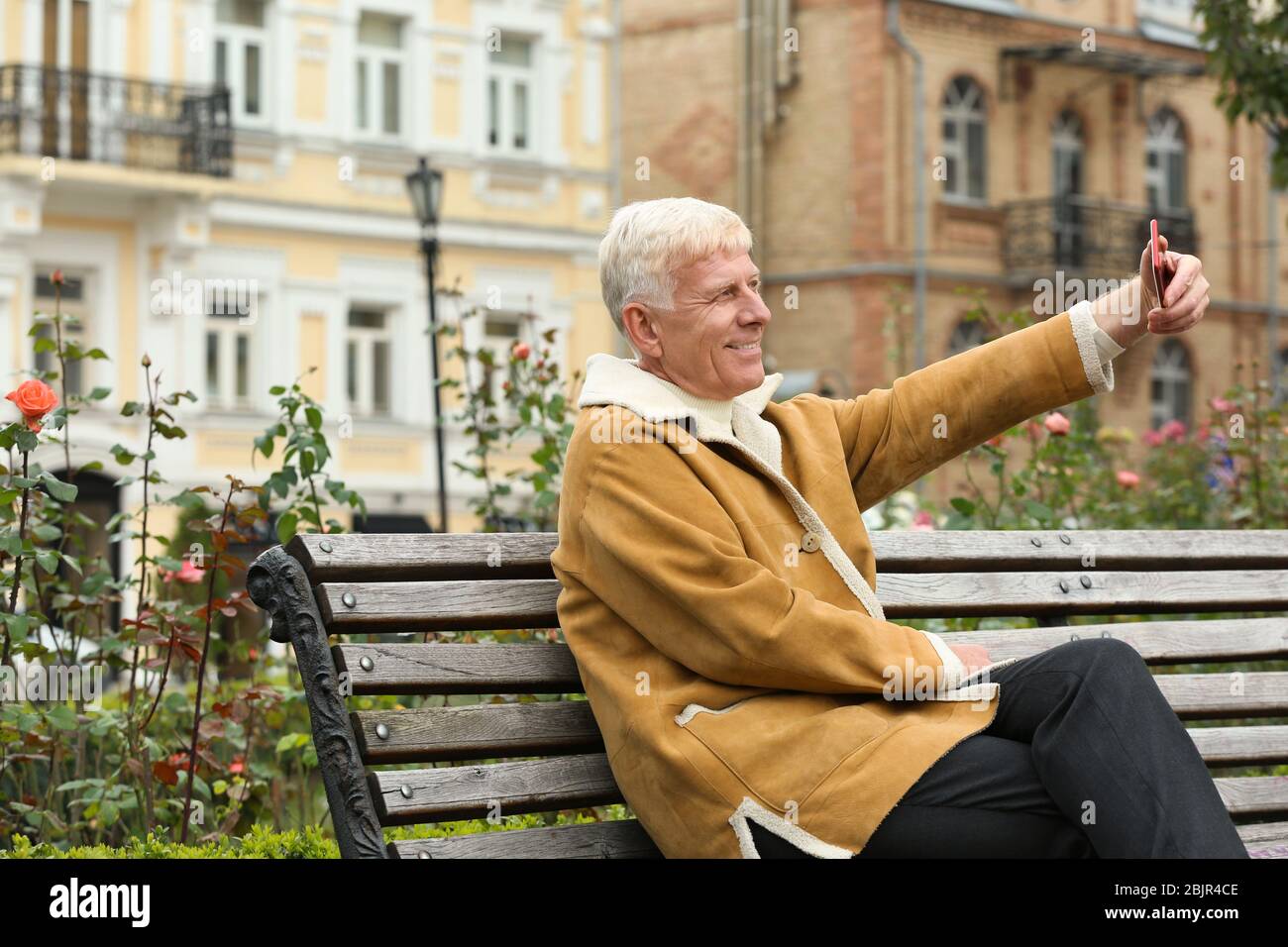 Photo handsome man pensioner hi-res stock photography and images - Alamy