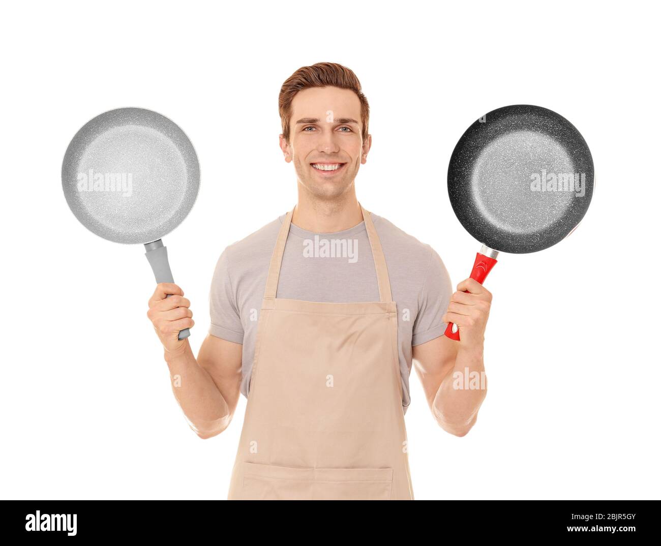 Holding frying pans hi-res stock photography and images - Alamy