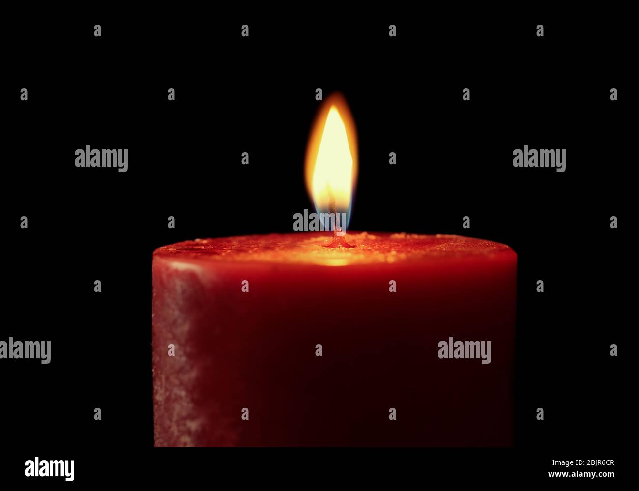 Burning candle on black background, closeup Stock Photo