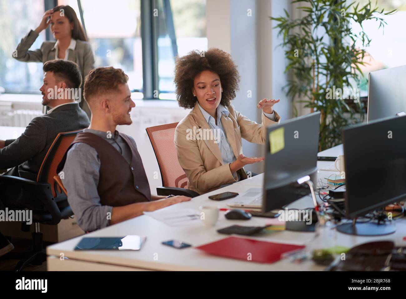 Sharing ideas between teammates ensures productivity, business concept Stock Photo