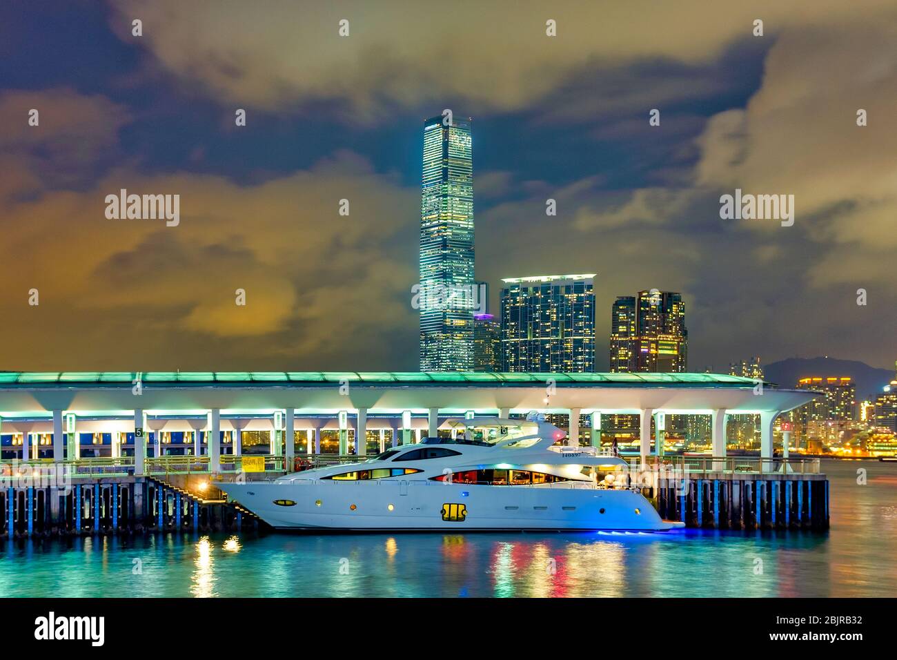 Yacht docked in the Central Pier #10 in Hong Kong Island, Hong Kong, China Stock Photo
