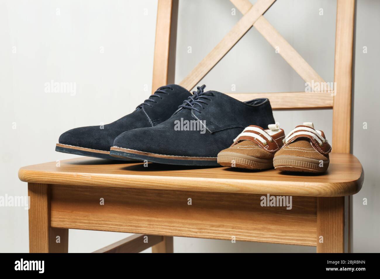 Dad and son shoes hires stock photography and images Alamy