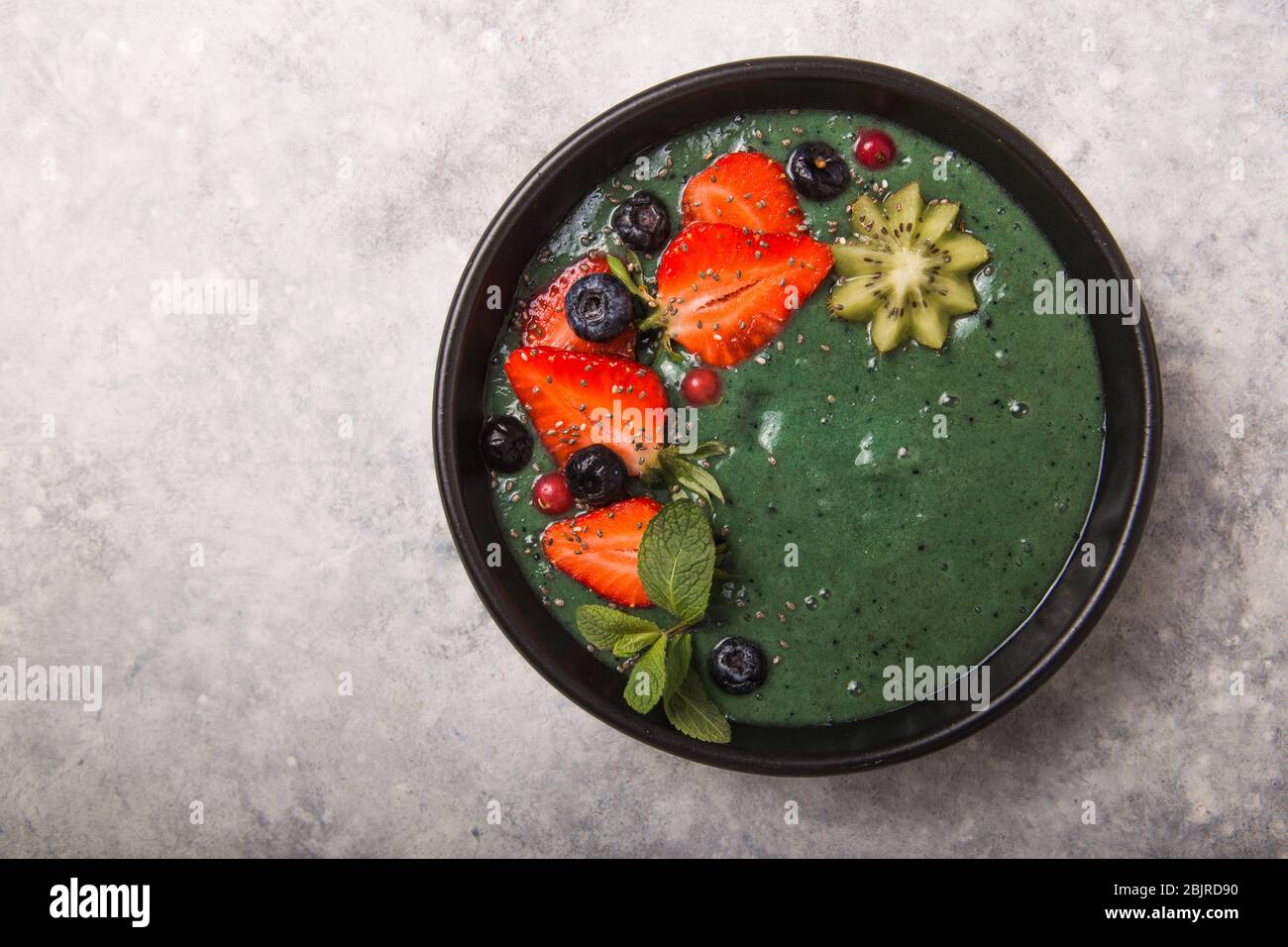 Colorful Healthy Food Acai Smoothie Bowl Keto Breakfast Idea Fruit Curd Smoothie Acai Breakfast With Green Spirulina Strawberry Chia Kiwi In Stock Photo Alamy