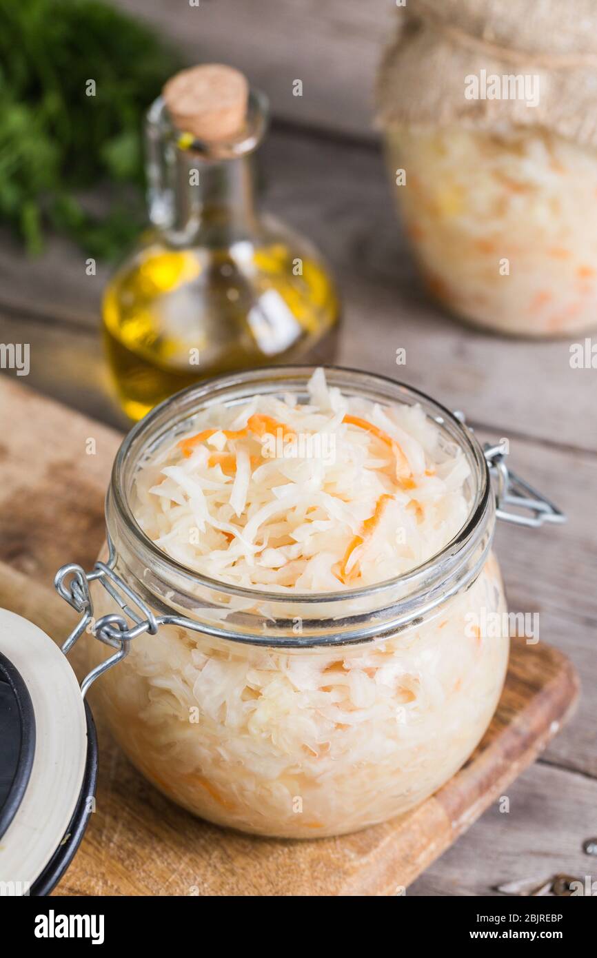 Sauerkraut fermented salad. Homemade fresh pickled cabbage (german sauerkraut) with ingredients