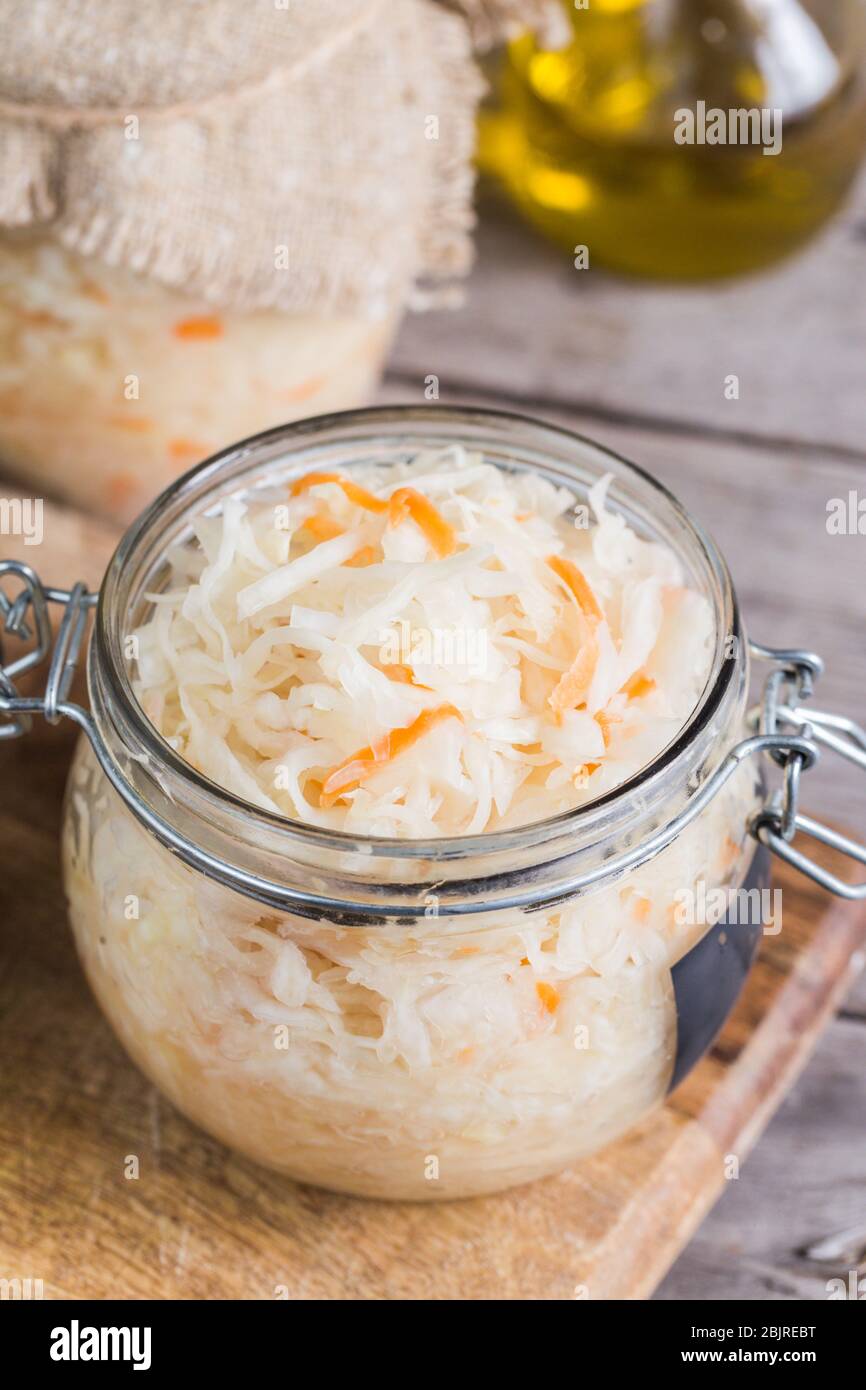 Sauerkraut fermented salad. Homemade fresh pickled cabbage (german sauerkraut) with ingredients