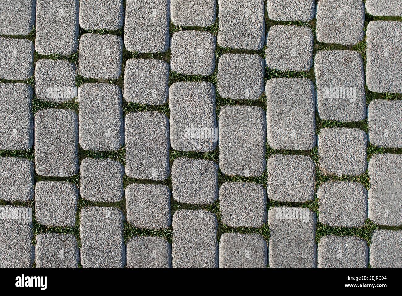 Abstract background of cobblestone pavement view from above Stock Photo ...