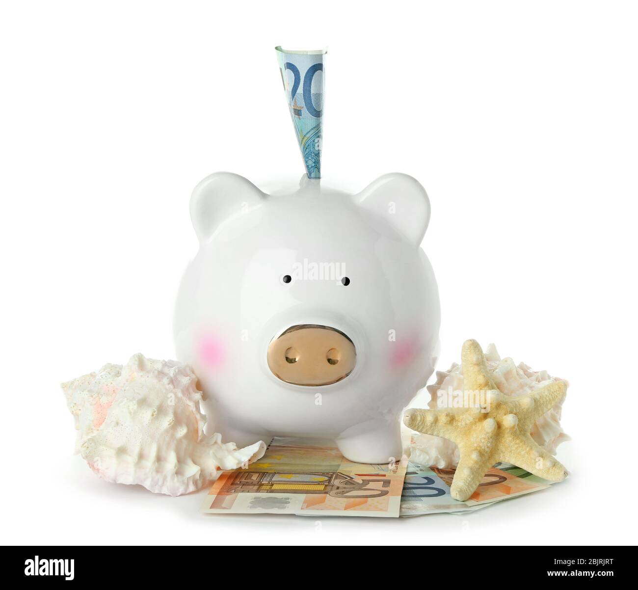 Ceramic piggy bank with money and shells on white background Stock ...