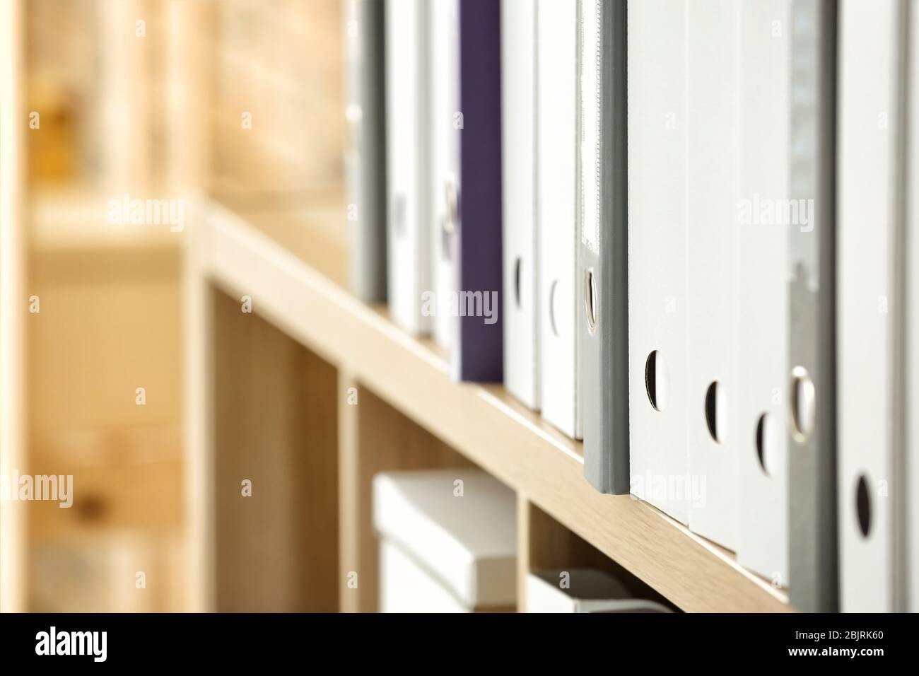 Many folders with documents on shelf in archive, closeup Stock Photo