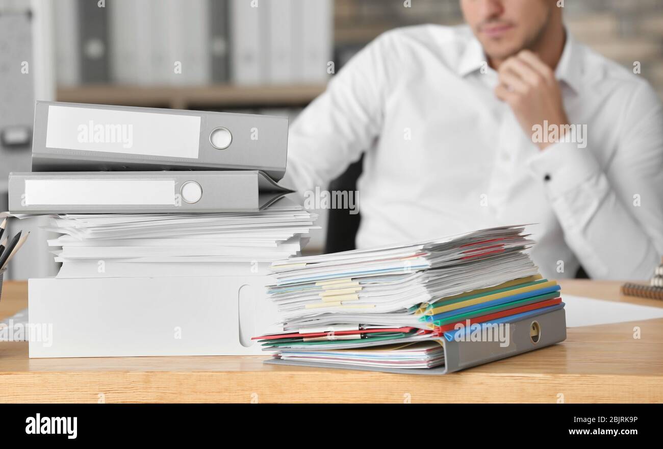 Man stack folders closeup hi-res stock photography and images - Alamy