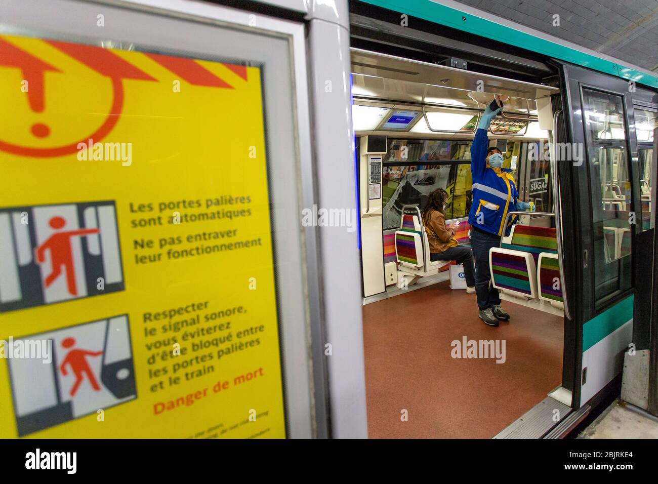 Paris, France. 30th Apr, 2020. A staff member of a private cleaning and disinfection company disinfects metro trains in Vincennes near Paris, France, April 30, 2020. Two weeks ahead of the exit plan being put into motion, France's coronavirus death toll rose to 24,087 while hospitalizations and patients in intensive care continued to decline on Wednesday. Credit: Aurelien Morissard/Xinhua/Alamy Live News Stock Photo