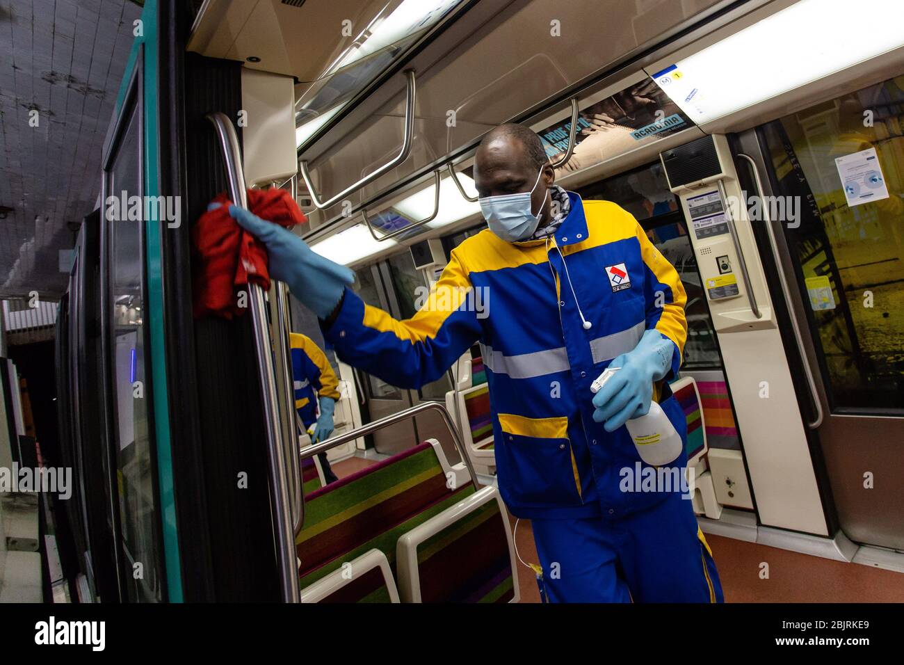 Paris, France. 30th Apr, 2020. Staff members of a private cleaning and disinfection company disinfect metro trains in Vincennes near Paris, France, April 30, 2020. Two weeks ahead of the exit plan being put into motion, France's coronavirus death toll rose to 24,087 while hospitalizations and patients in intensive care continued to decline on Wednesday. Credit: Aurelien Morissard/Xinhua/Alamy Live News Stock Photo