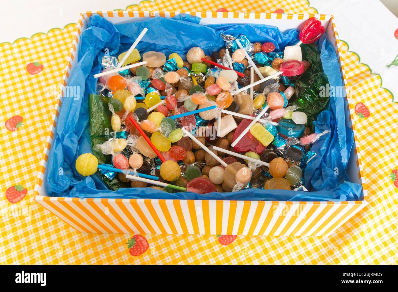 Variety of colorful candies inside a box Stock Photo Alamy