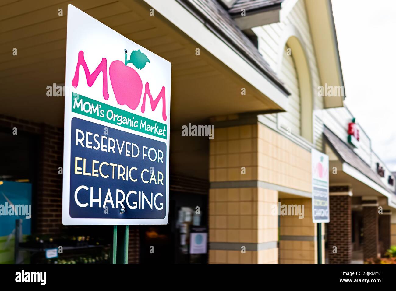 Electric vehicle charger shopping mall hires stock photography and images Alamy
